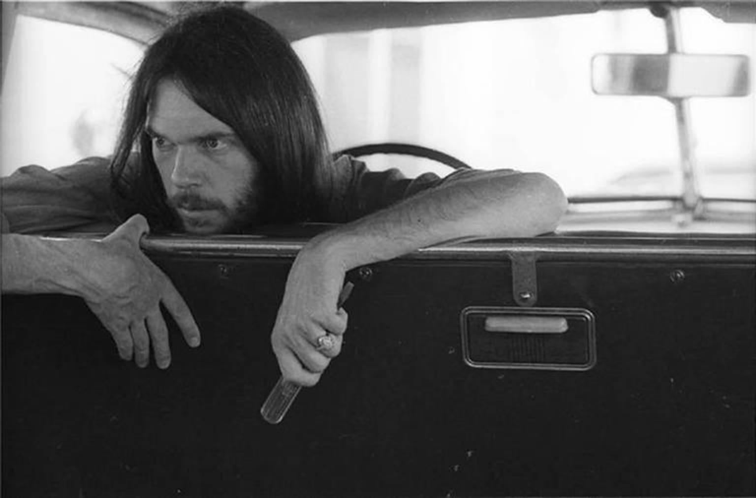 Henry Diltz Black and White Photograph – Neil Young, 1971