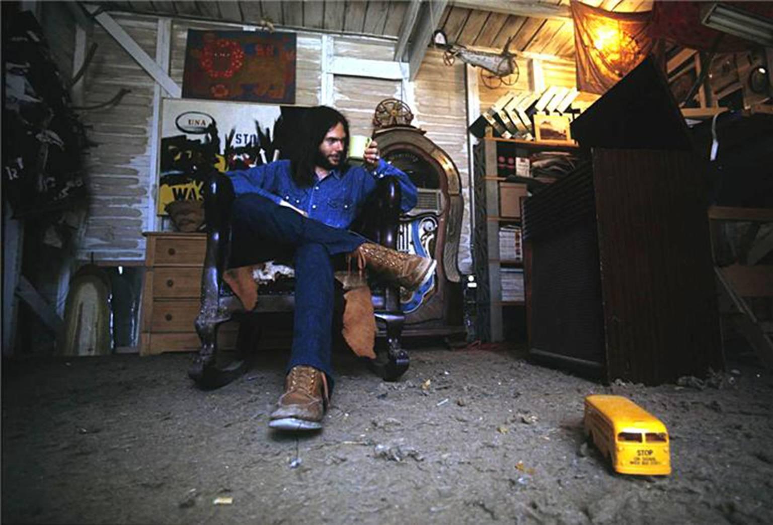 Henry Diltz Portrait Photograph - Neil Young Juke Box, 1971