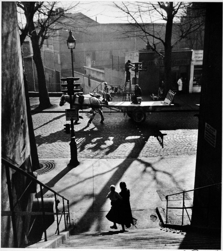 Avenue Simon Bolivar - Willy Ronis, 20th Century, French Humanist Photography - Black Black and White Photograph by Willy Ronis