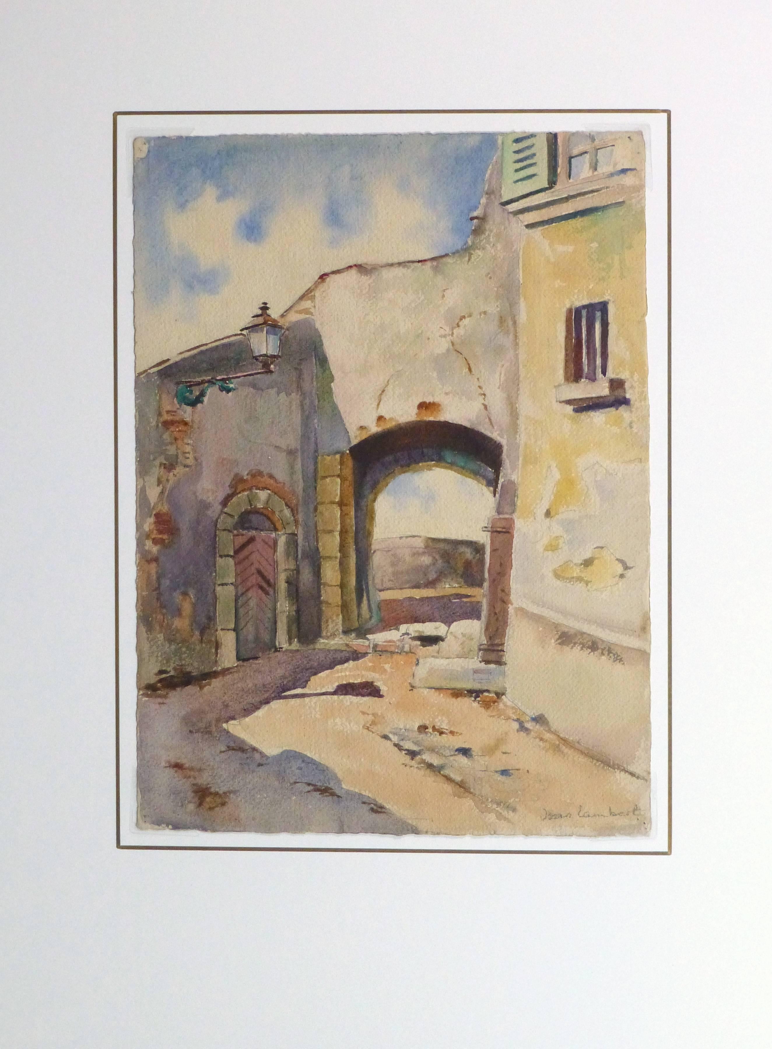 Charming watercolor landscape painting of an arched stone entrance to a small village in Provence, France by artist Jean Lambert, circa 1940. Signiert unten rechts.

Original artwork on paper displayed on a white mat with a gold border. Archival
