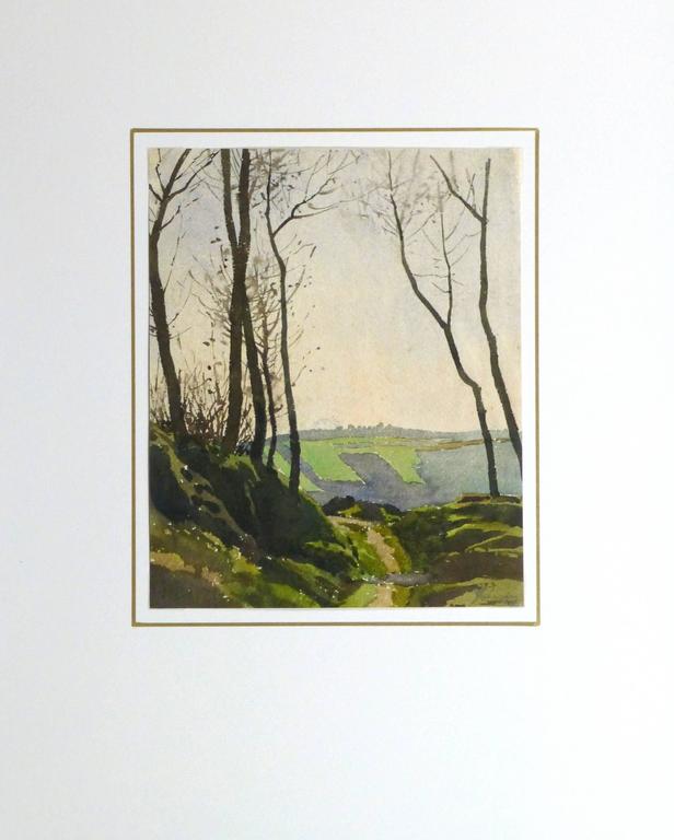 Soothing French watercolor of a winding trail on the edge of a mossy forest, circa 1930. Signed lower right.

Original artwork on paper displayed on a white mat with a gold border. Archival plastic sleeve and Certificate of Authenticity included.