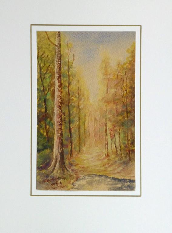 Dazzling French watercolor of fall colored foliage lining a large path, circa 1920. Signed lower right.

Original artwork on paper displayed on a white mat with a gold border. Archival plastic sleeve and Certificate of Authenticity included.