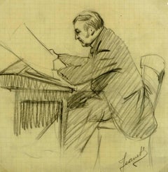 Man Reading at Desk
