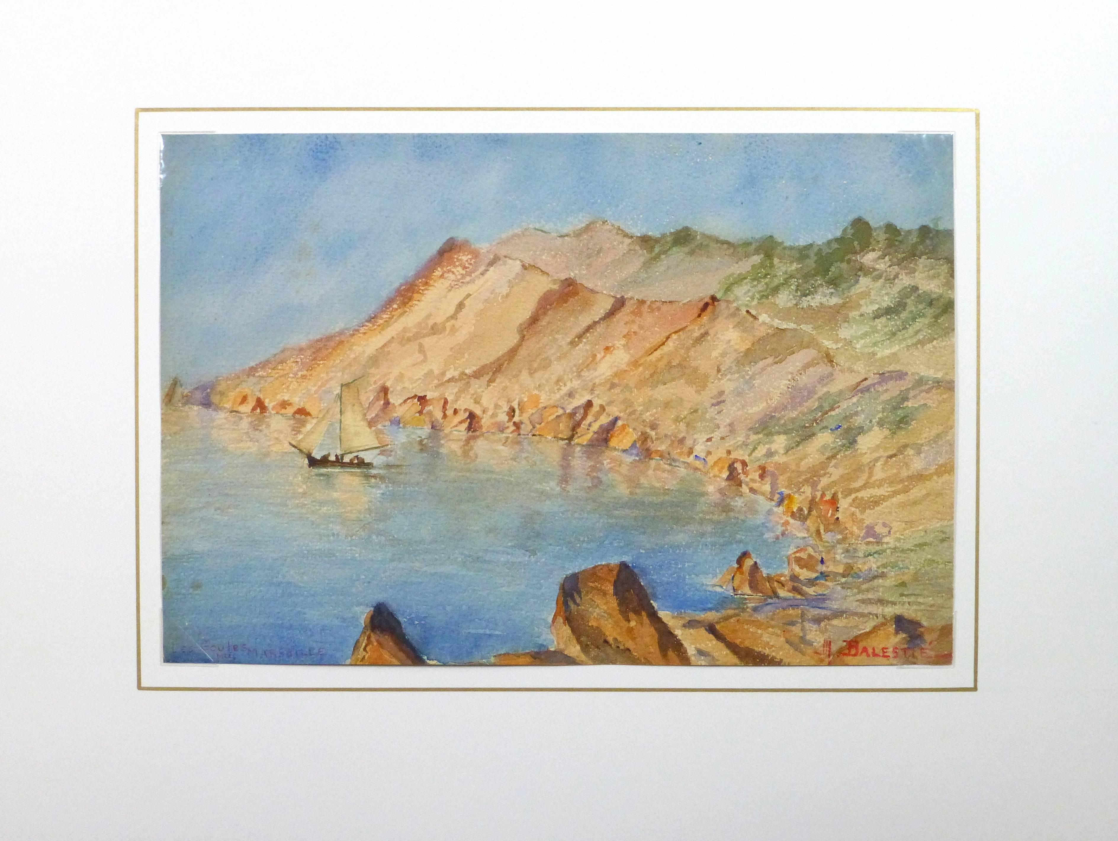 Bright watercolor landscape of a sailboat drifting in a small cove ringed by red rock mountains by artist M. Balestié, circa 1930. Titled lower left and signed lower right.

Original one-of-a-kind artwork on paper displayed on a white mat with a