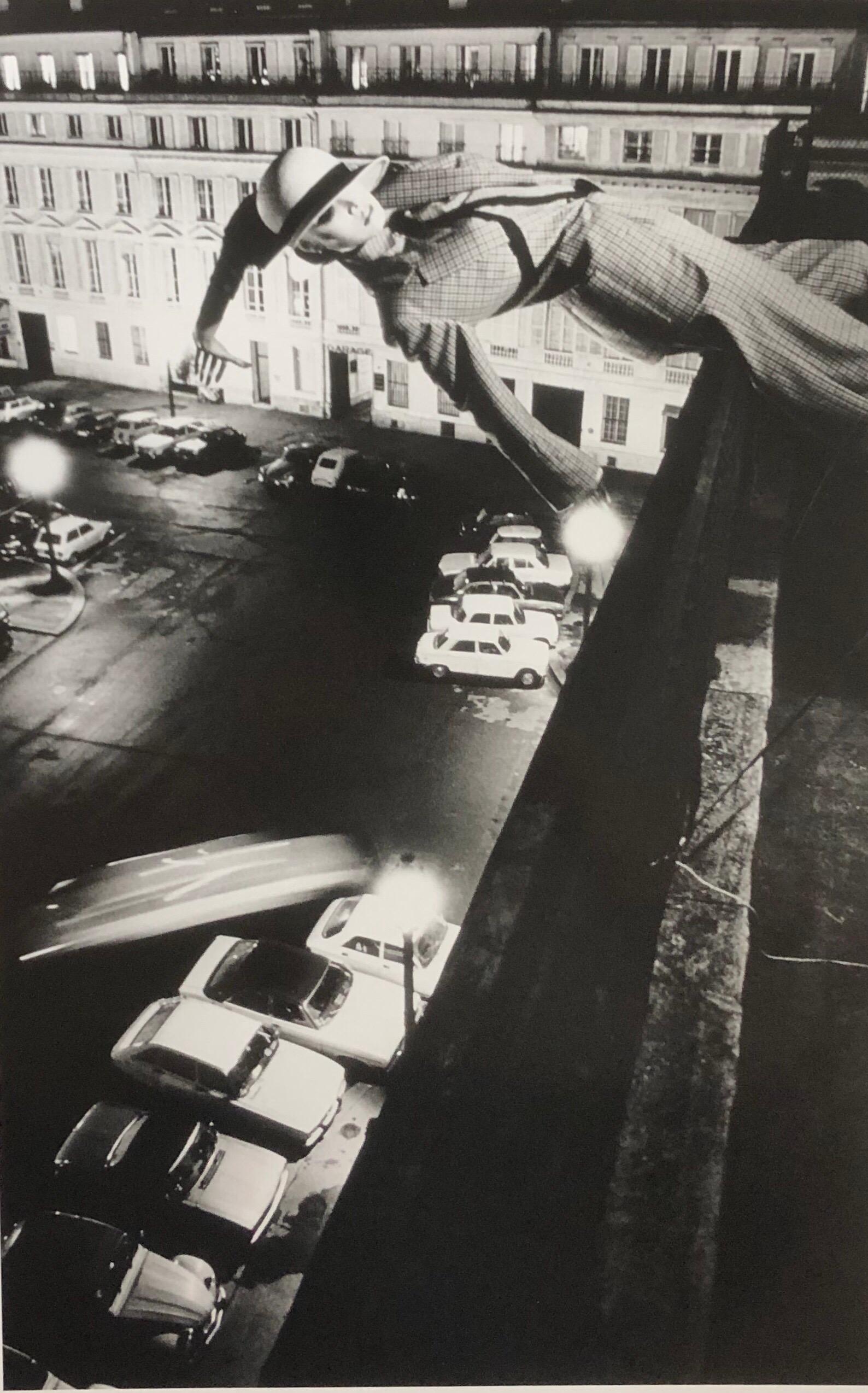 In ‘Mannequin Toss, Paris 1978’, Newton recreates a surrealistic image taking direction from Yves Klein's seminal "Leap Into the Void'.  The unnatural form of the figure, uncommon perspective, and the contrast between the stillness of the figure and