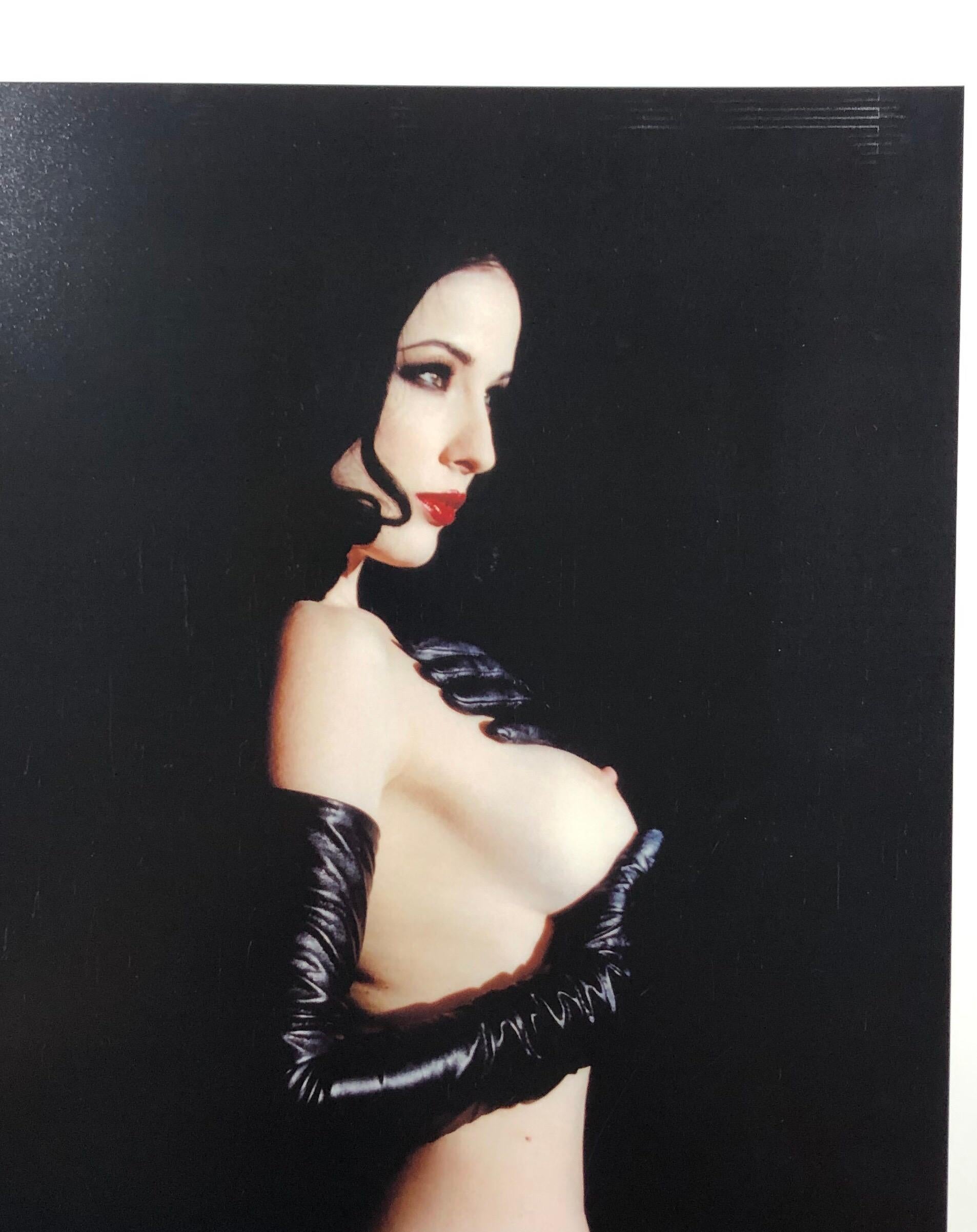 Playboy Legacy Collection “La Vita Dita” original fine art print featuring burlesque goddess, Dita Von Teese. This image was shot in 2002 by goth rocker, Marilyn Manson, who at the time was her husband.  Image is UNPUBLISHED and only available in