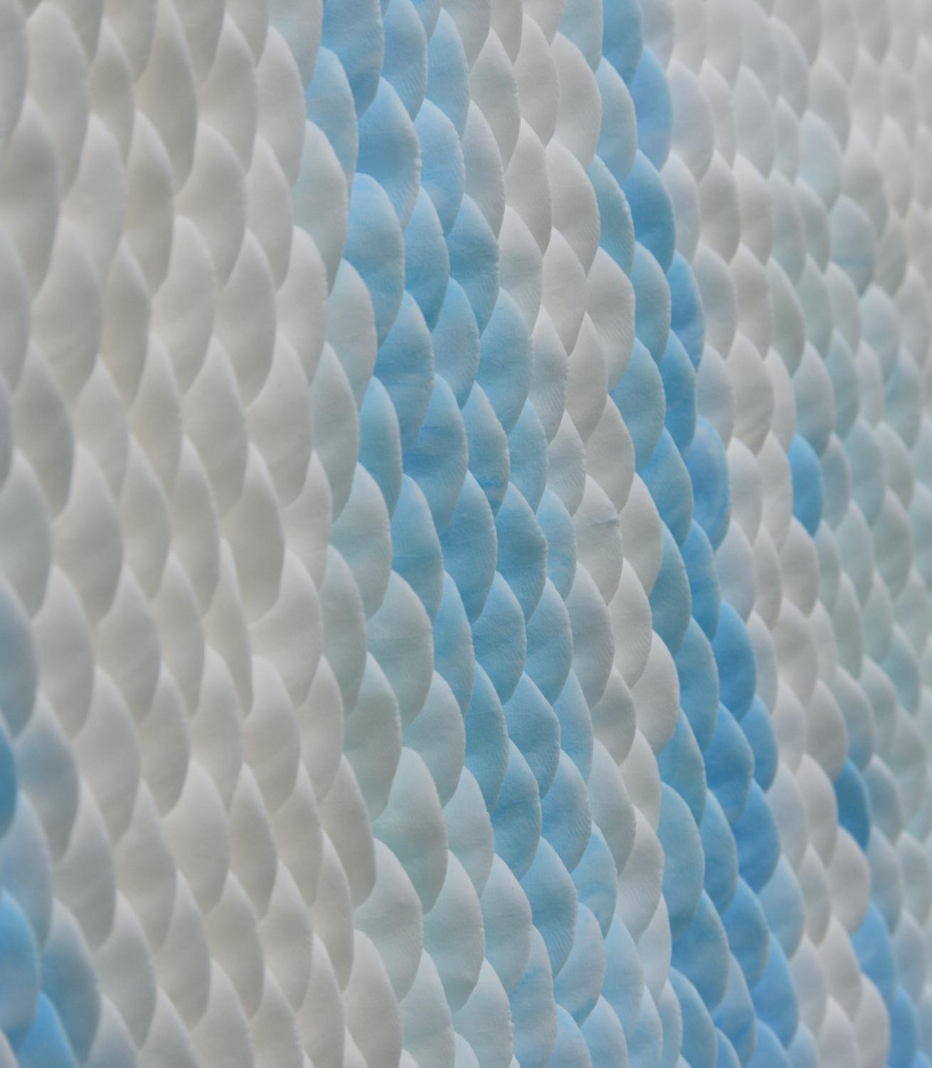 White and sky blue, porcelain. Petals. Using clay, porcelain, cotton swaps and aluminum; the Korean artist Ye Jin-Young creates sculptural, wall-object art that resemble petals, which flow in patterns found in nature. The composition of his works,
