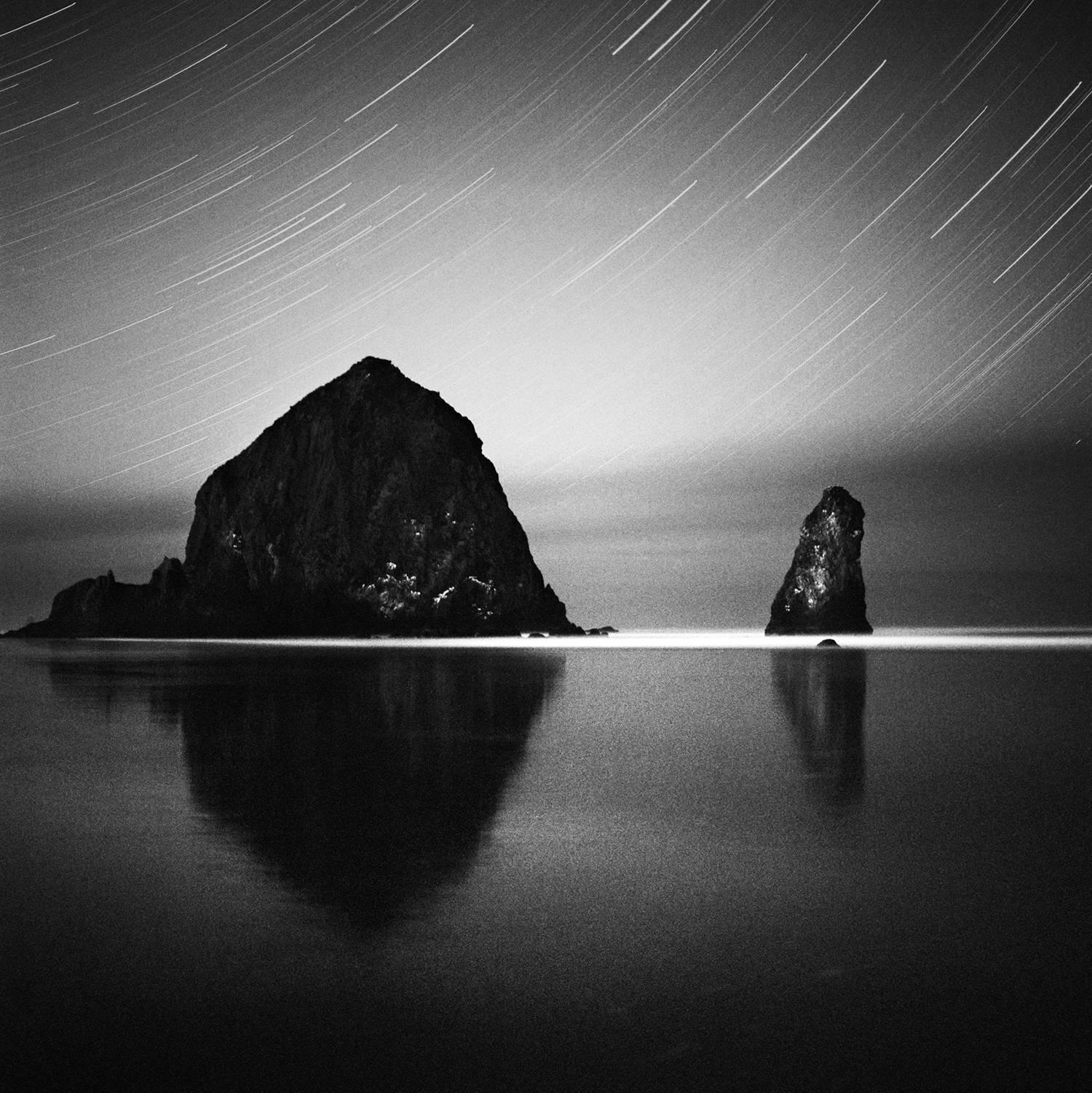 Mindaugas Gabrenas Black and White Photograph - Spinning the Wheel