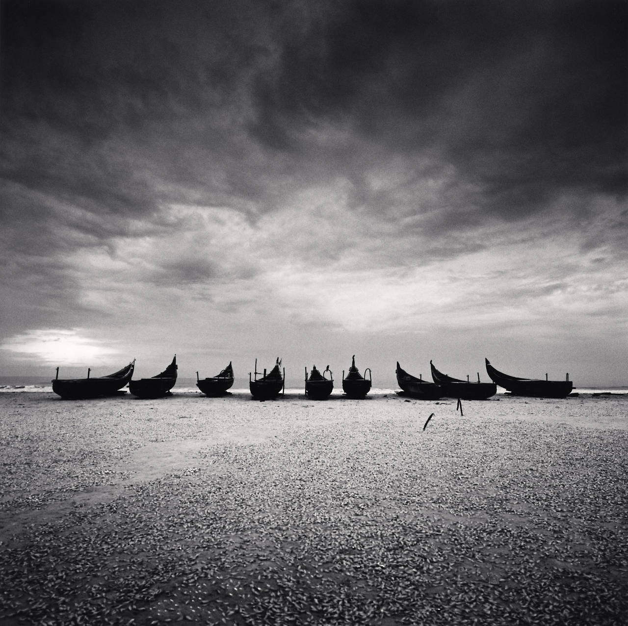 Michael Kenna Black and White Photograph - Nine Boats, Andakarnnazi Beach, Kerala, India, 2008