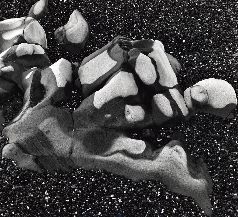 Brett Weston Abstract Photograph - Beach Rocks