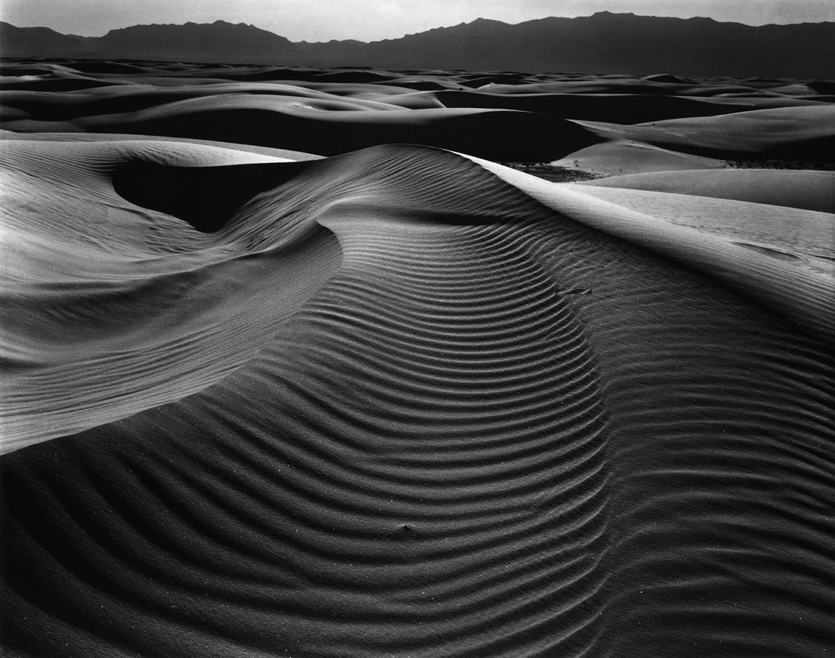Brett Weston Landscape Photograph - Dunes and Mountains