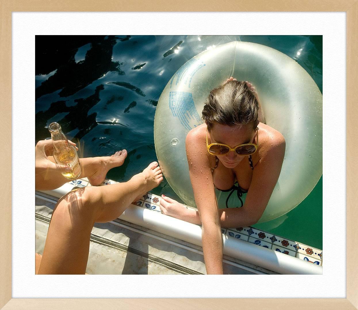 ABOUT THIS PIECE: Louise in Pool, Los Angeles. The husband/wife team, Jeremy and Claire Weiss prefer not to pose their subjects, but let them get comfortable with the shoot and capture authentic moments. 
    
ABOUT THIS ARTIST: The husband/wife