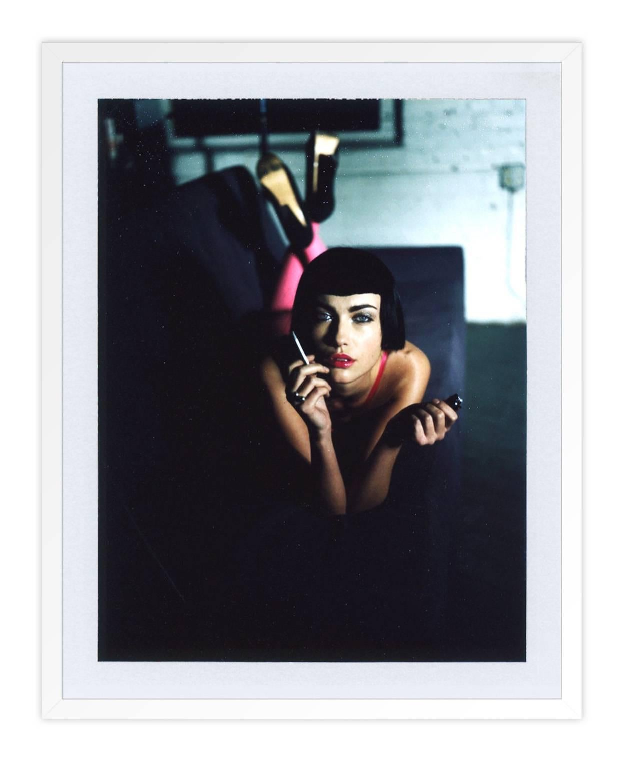 Girl Smoking a Cigarette - Black Figurative Photograph by Ernesto Gonzalez