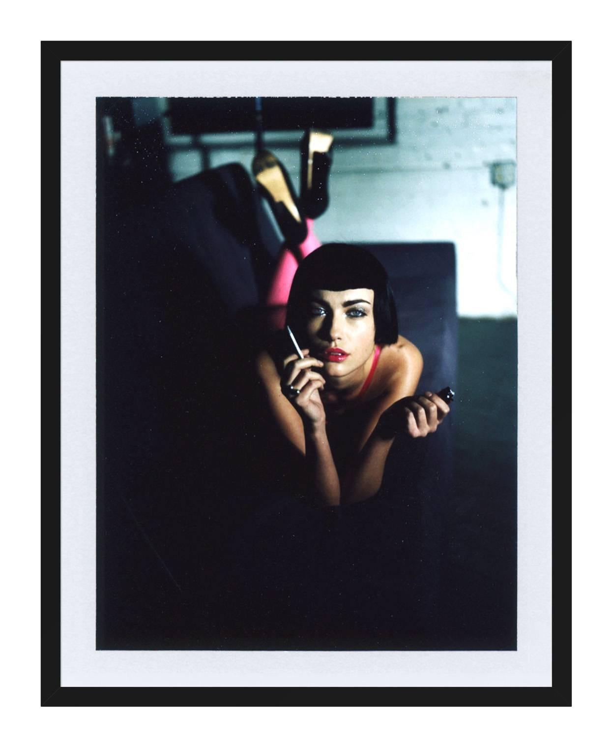 ABOUT THIS PIECE: *Polaroid image with grain and ink spots consistant with a polaroid photo.*
Raised in Mexico City, Ernesto's background is reflected in the energy of his photos. His imagery is colorful, bright and vibrant with positive energy. He