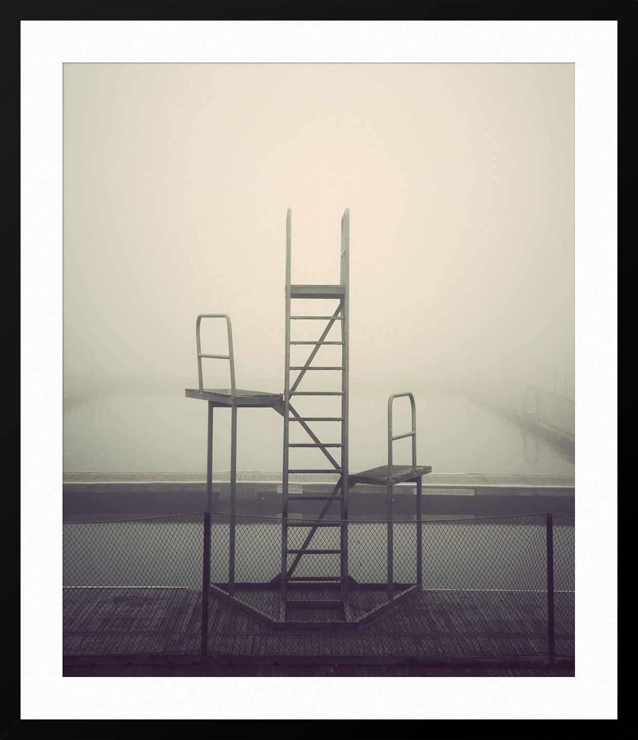 ABOUT THIS PIECE: This photograph was shot in the Copenhagen Harbour at the ''Copencabana'' on an early Sunday morning in epic fog. Photographer Kim Høltermand is known for his moody, quiet photos that show public spaces before the crowds. They