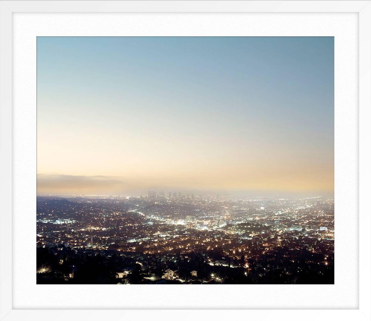 ABOUT THIS PIECE: French artist Ludwig Favre traveled to California to shoot the state's most iconic landscape and architecture. He captures the city at dusk from the top of the Griffith Observatory.

ABOUT THIS ARTIST: Photographer Ludwig Favre was
