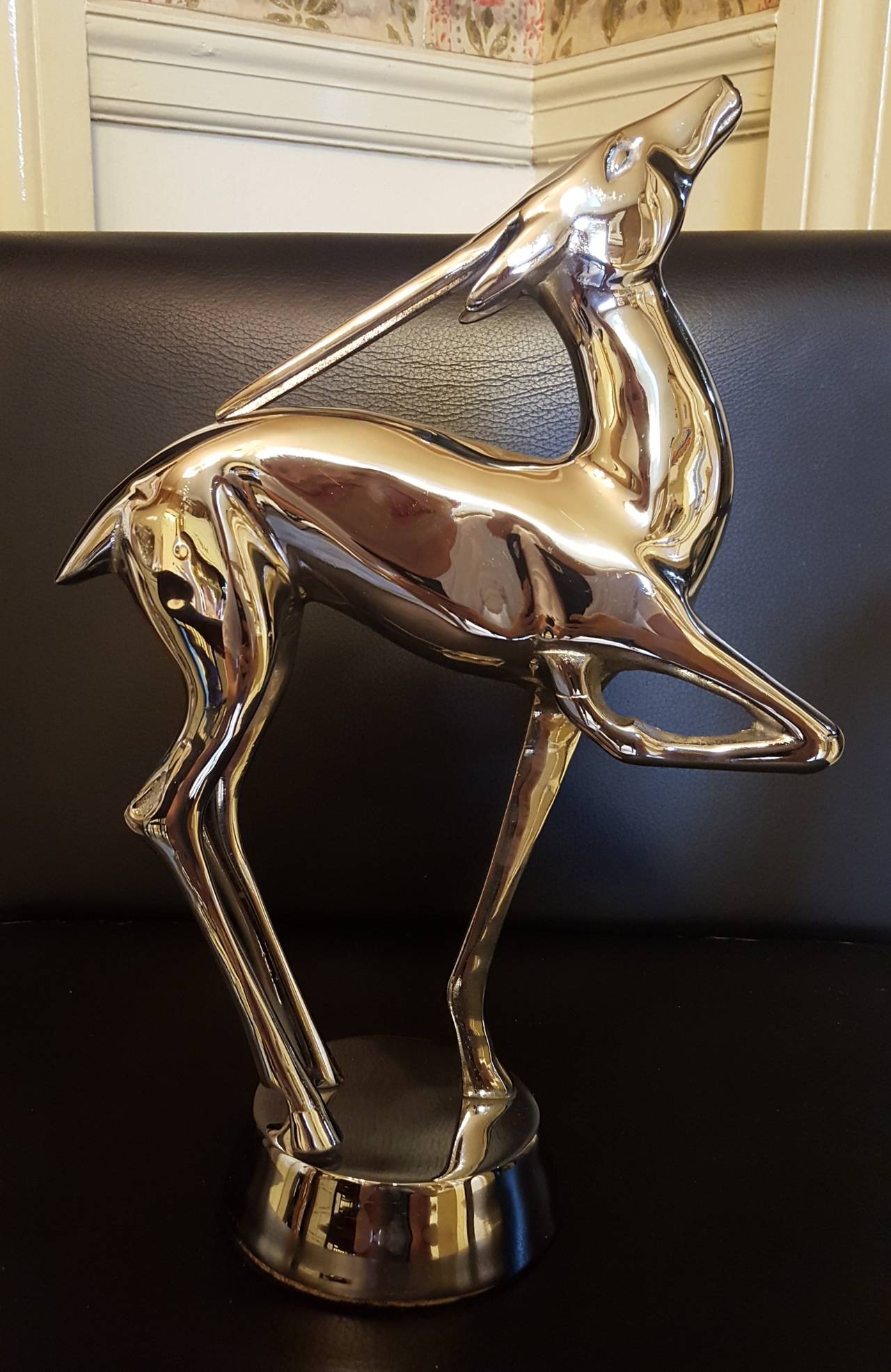 1930's Solid Chrome Art Deco Gazelle statue, unsigned. This beautiful rare piece of art deco sculpture weighs 5 pounds. Measures 14.5