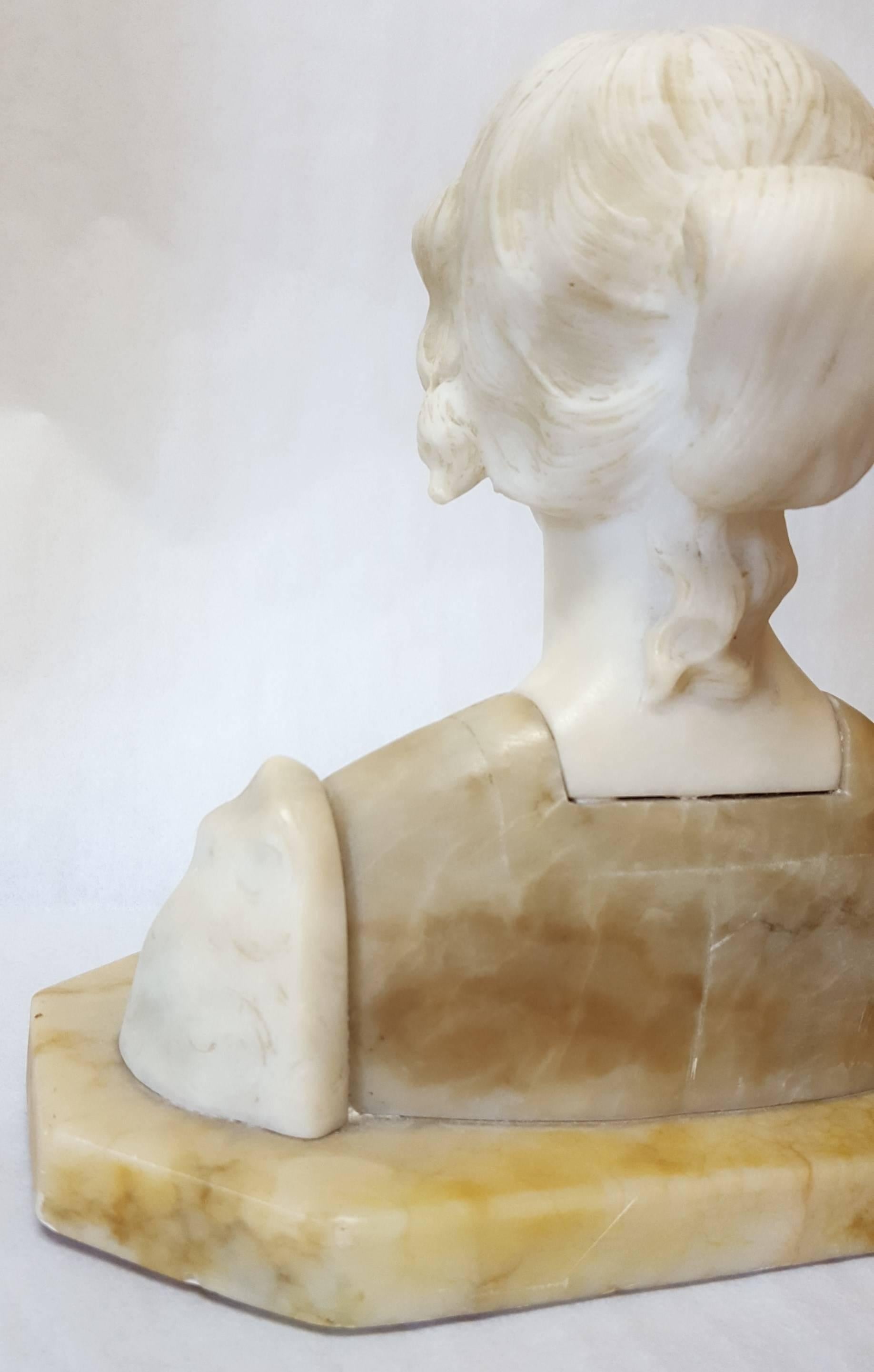An original carved marble and alabaster sculpture bust attributed to Italian artist Giuseppe Bessi (1857-1922) titled 