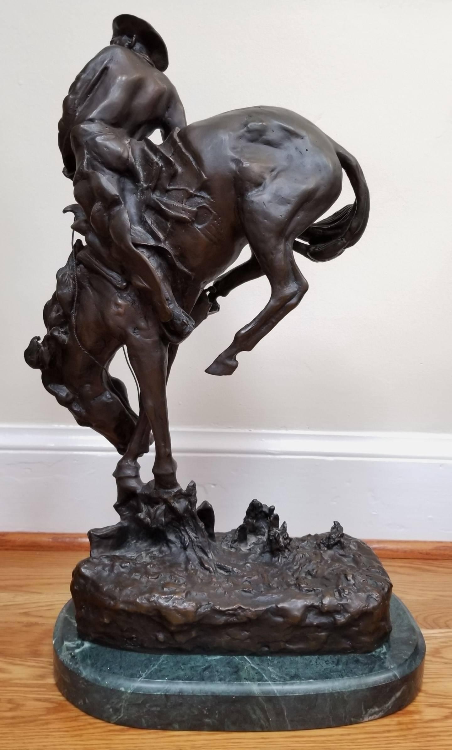 An original lost-wax bronze cast sculpture after American artist Frederic Remington (1861-1909) titled 