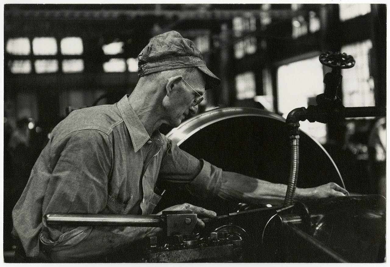 Alfred Statler Black and White Photograph - Machinist at Work