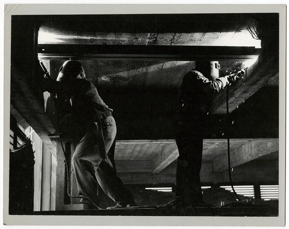 Welders - Modern Photograph by Alfred Statler