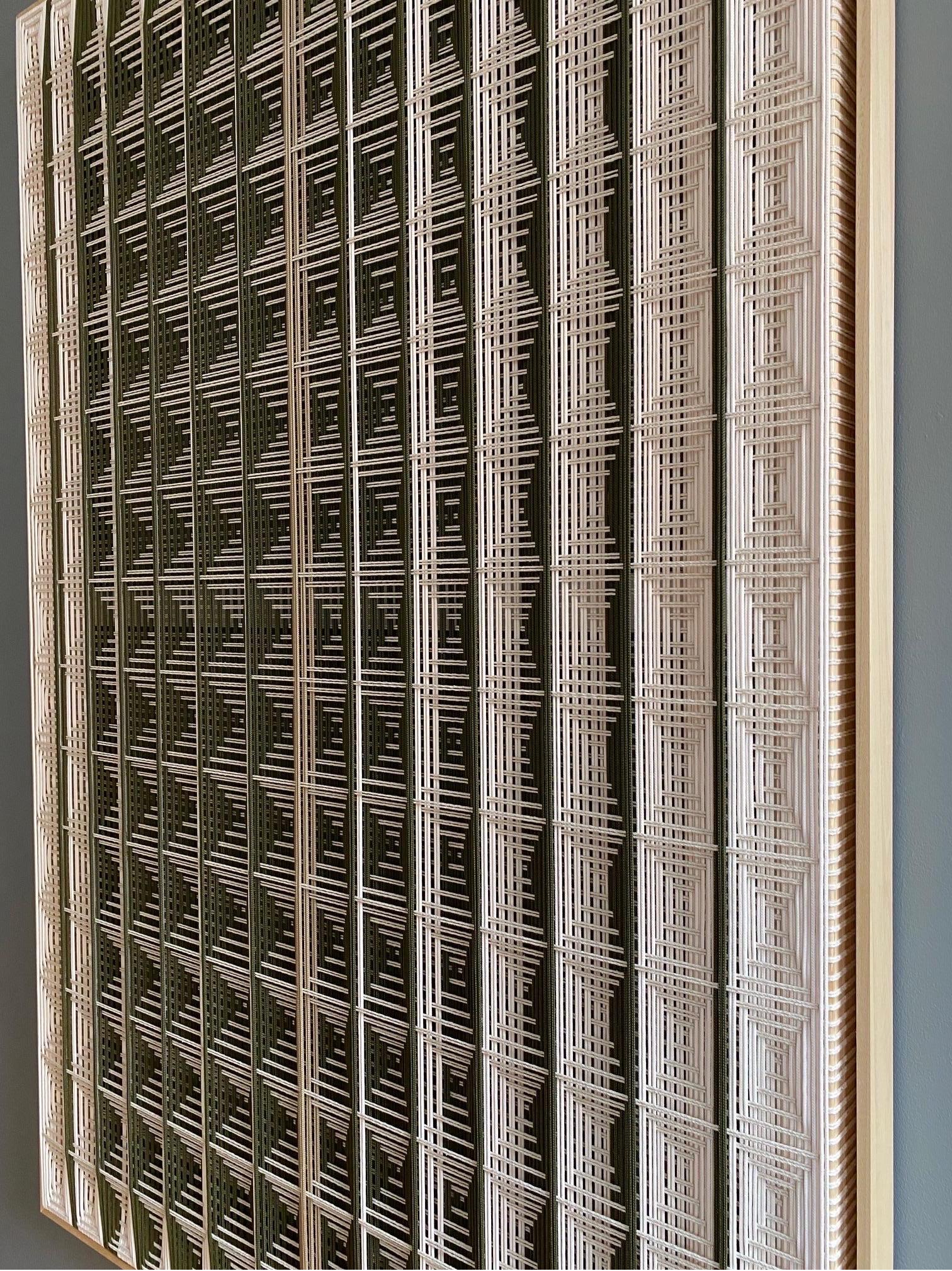 Grid, 2020
Free style weaving
150x100cm
Natural wood frame
