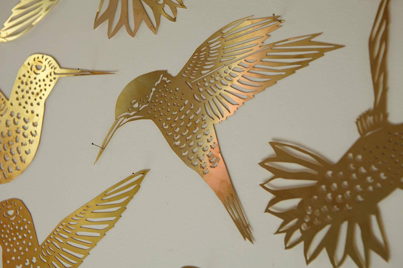 Installation of 30 acid etched brass hummingbirds, limited edition of 5.