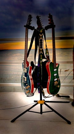 «Guitarras al atardecer», fotorrealismo, impresión de 8 x 10, 2026, de Deborah Benedic