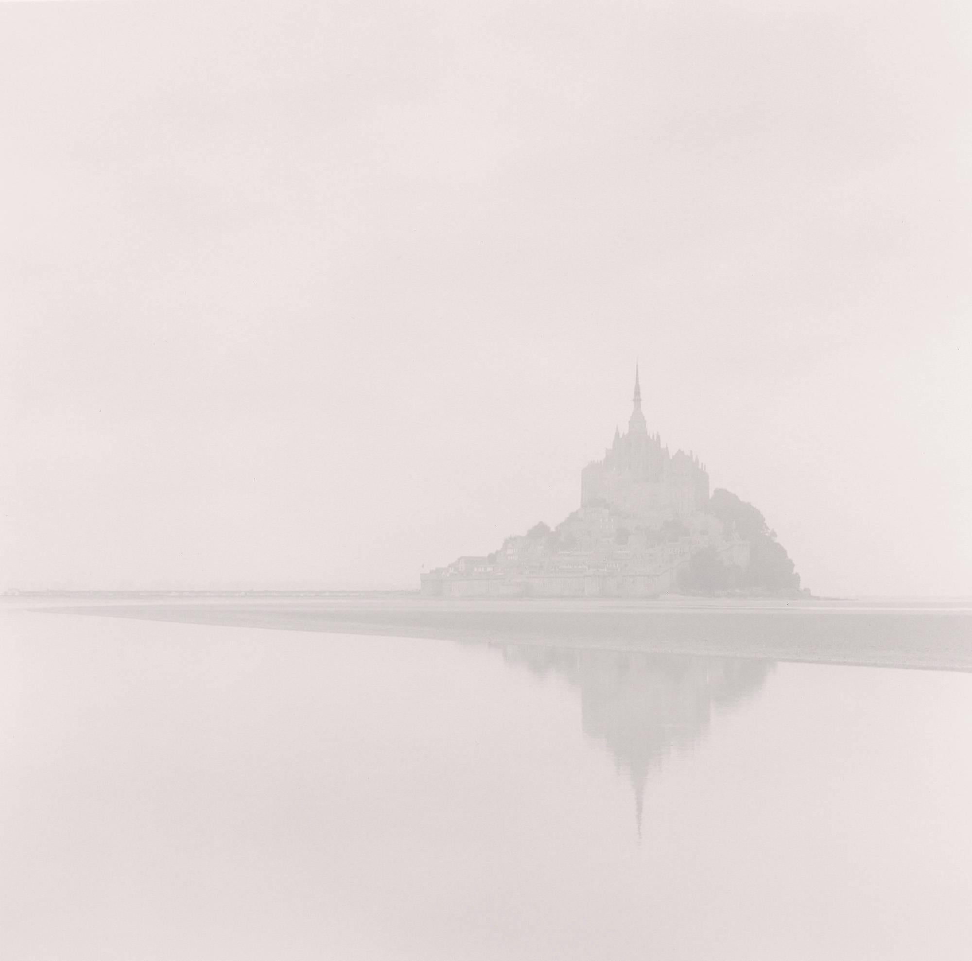Michael Kenna Landscape Photograph - Dawn Mist, Mont St. Michel, France