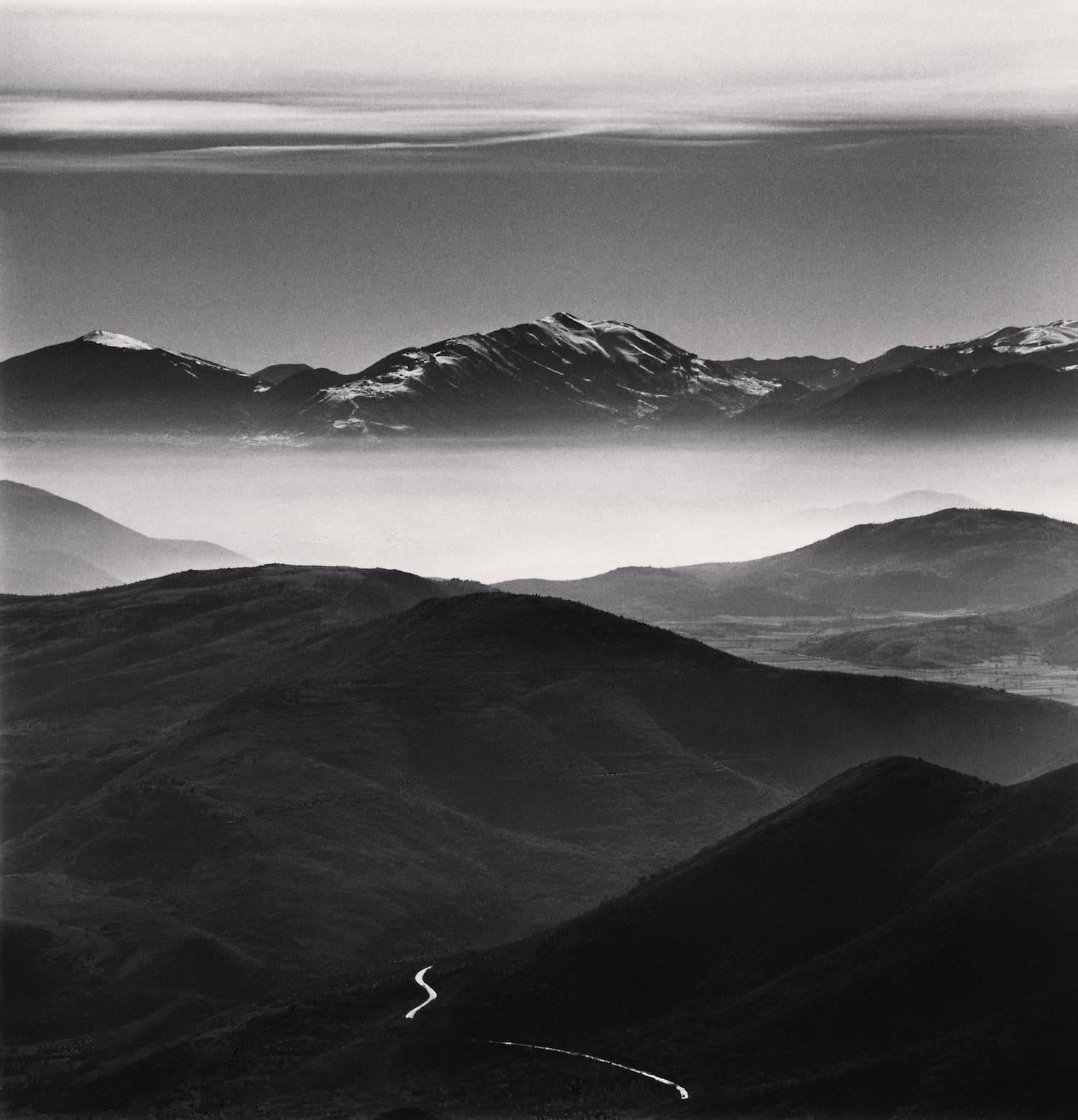 Michael Kenna Black and White Photograph - Mountain Road, Calascio, Abruzzo, Italy