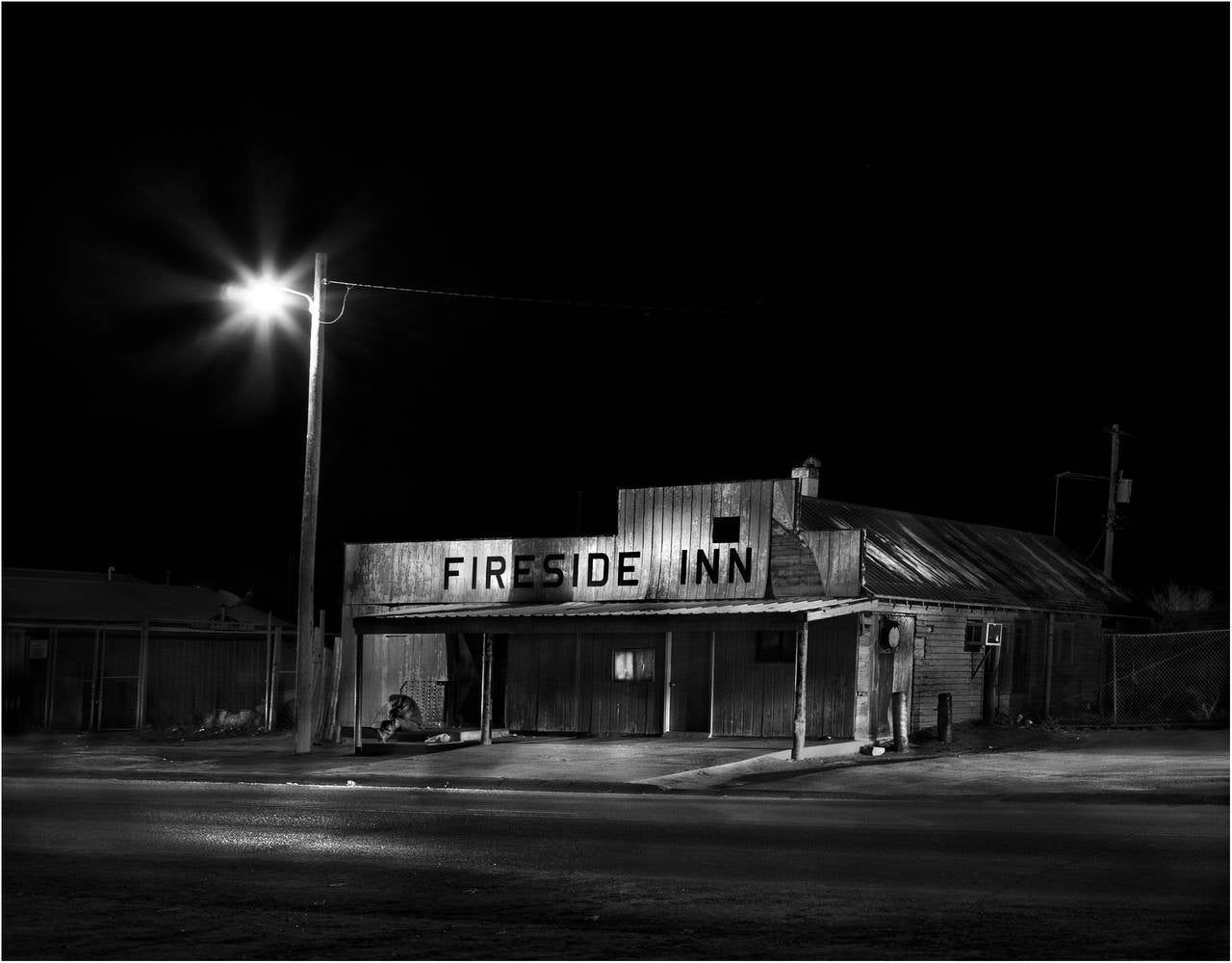 Teri Havens Black and White Photograph - Fireside Inn, Whiteclay, Nebraska