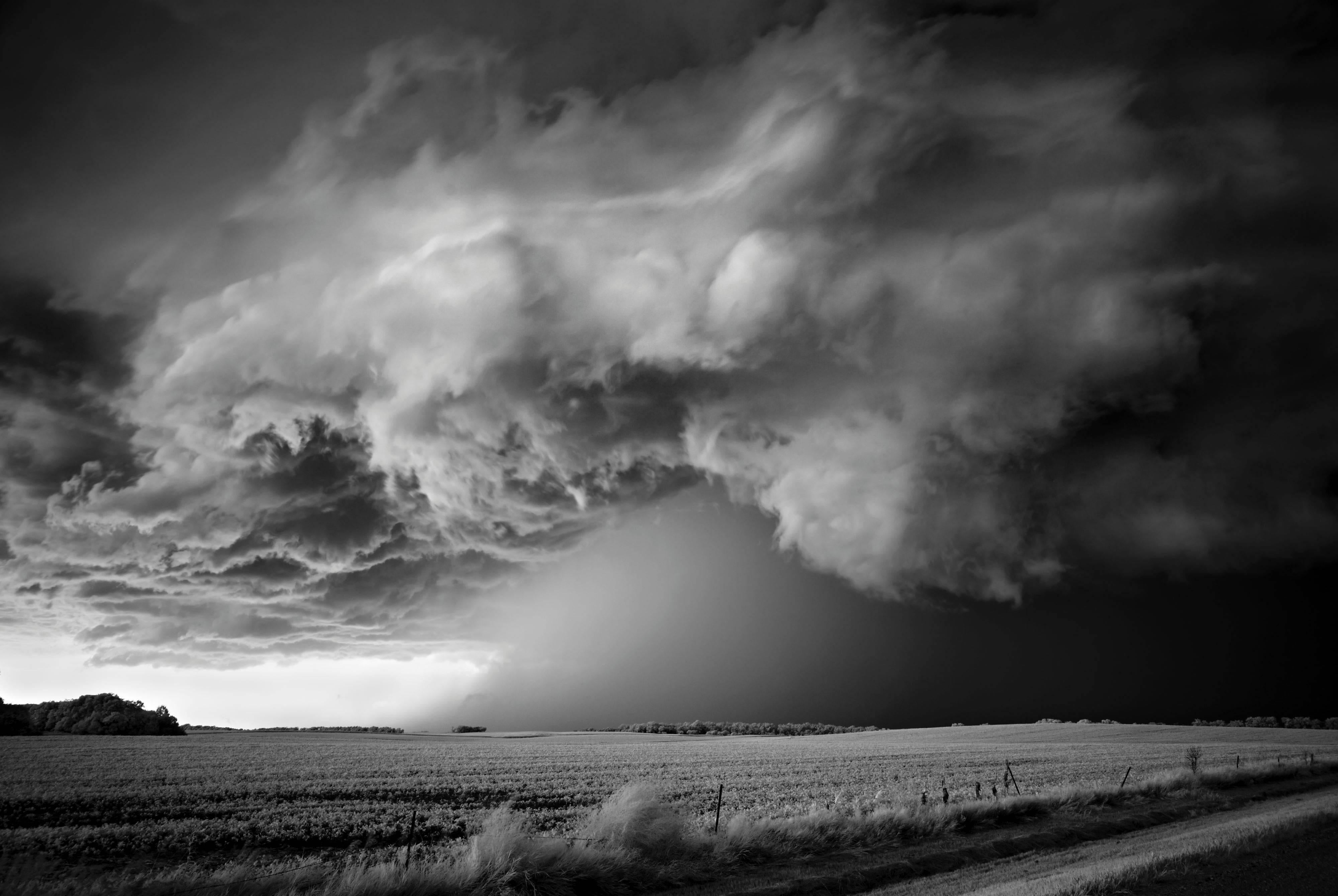 Mitch Dobrowner Black and White Photograph - Storm Over Field