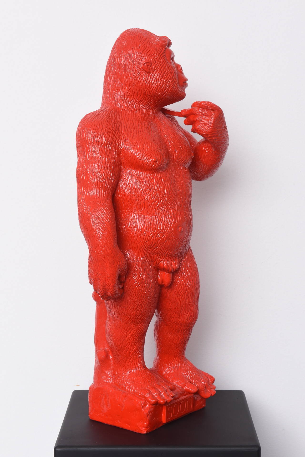 Soon is a resin sculpture made by Patrick Schumacher, a French contemporary artist. This sculpture represents a gorilla in the posture of the "David" Renaissance sculpture by Michelangelo. 
"Through my artistic work, I try to