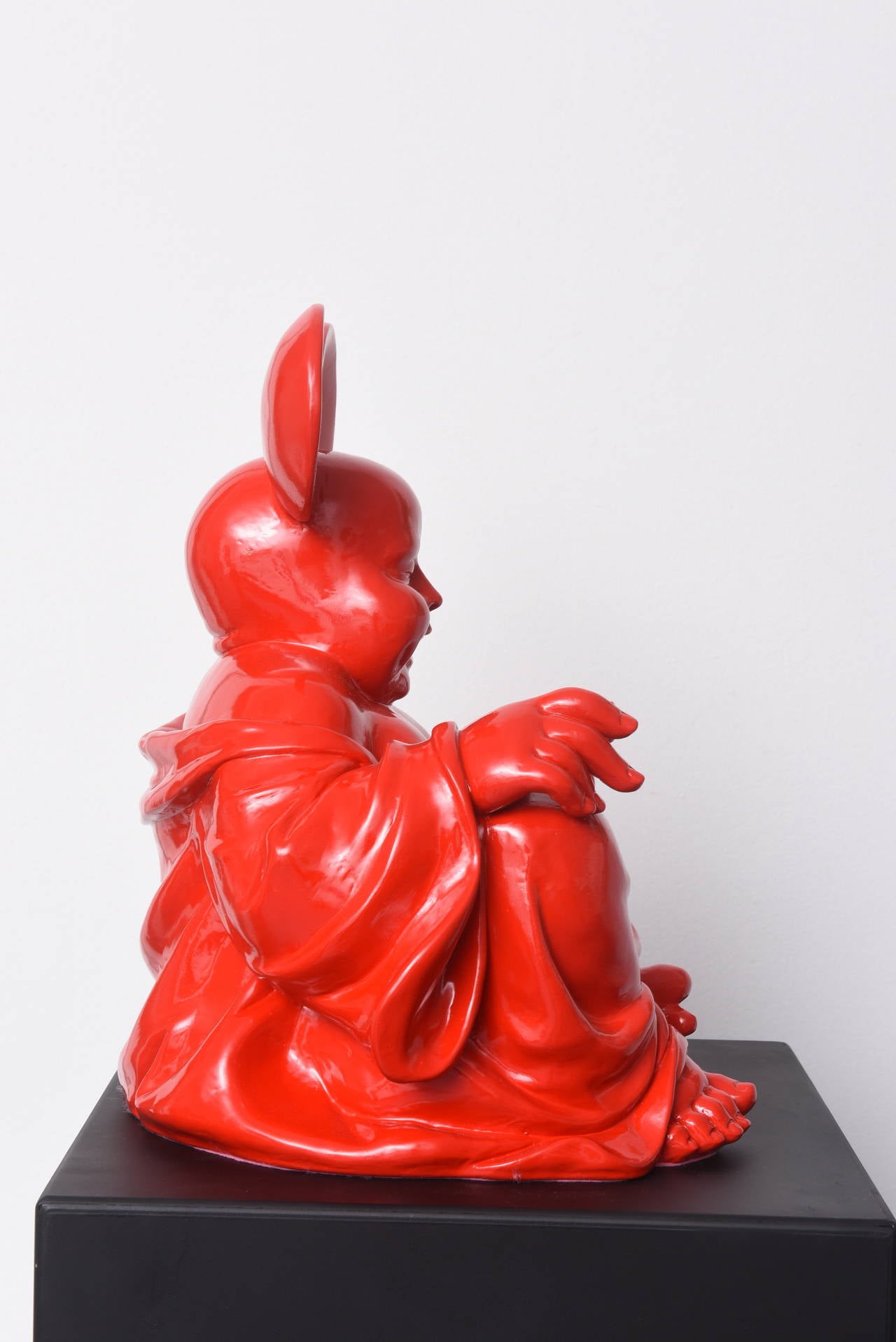 Boud'key is a resin sculpture made by Patrick Schumacher, a French contemporary artist. This fusion between Buddha and Mickey is the artist's ironic response to the term “globalization” and the rise of consumer society at the expense of
