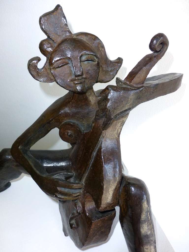 Mariko’s Violoncelliste is a contemporary bronze sculpture with a black patina, color in reference to ebony, which best reveals the light in the material.

Growing up in Africa, Mariko was influenced by this culture and then, studying at “Les