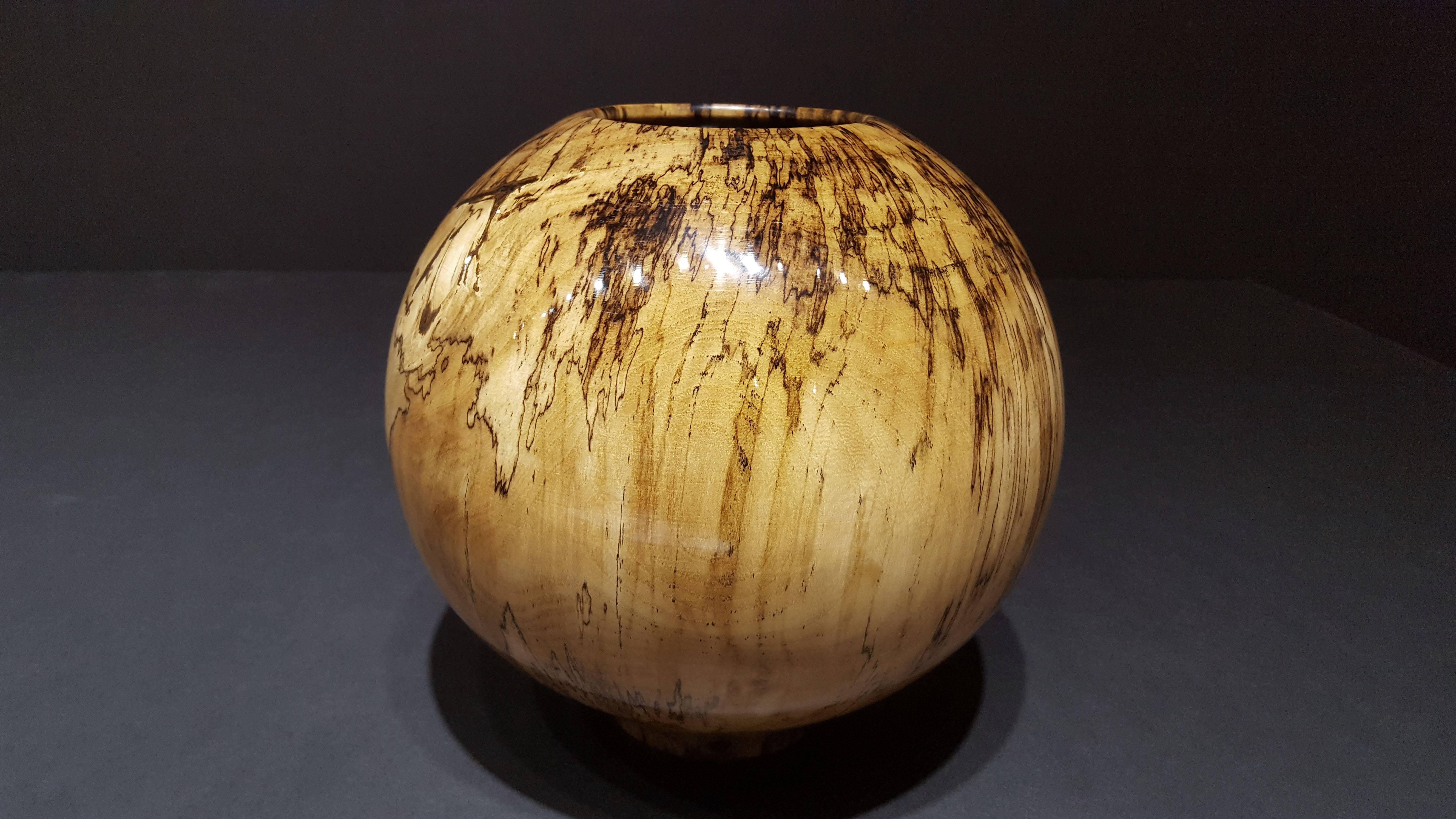 turned wood

Philip Moulthrop approaches his practice with the goal in mind to reveal the beauty and texture found in wood. He uses wood from trees native to his home in the southeastern United States. These are not exotic woods, however, they
