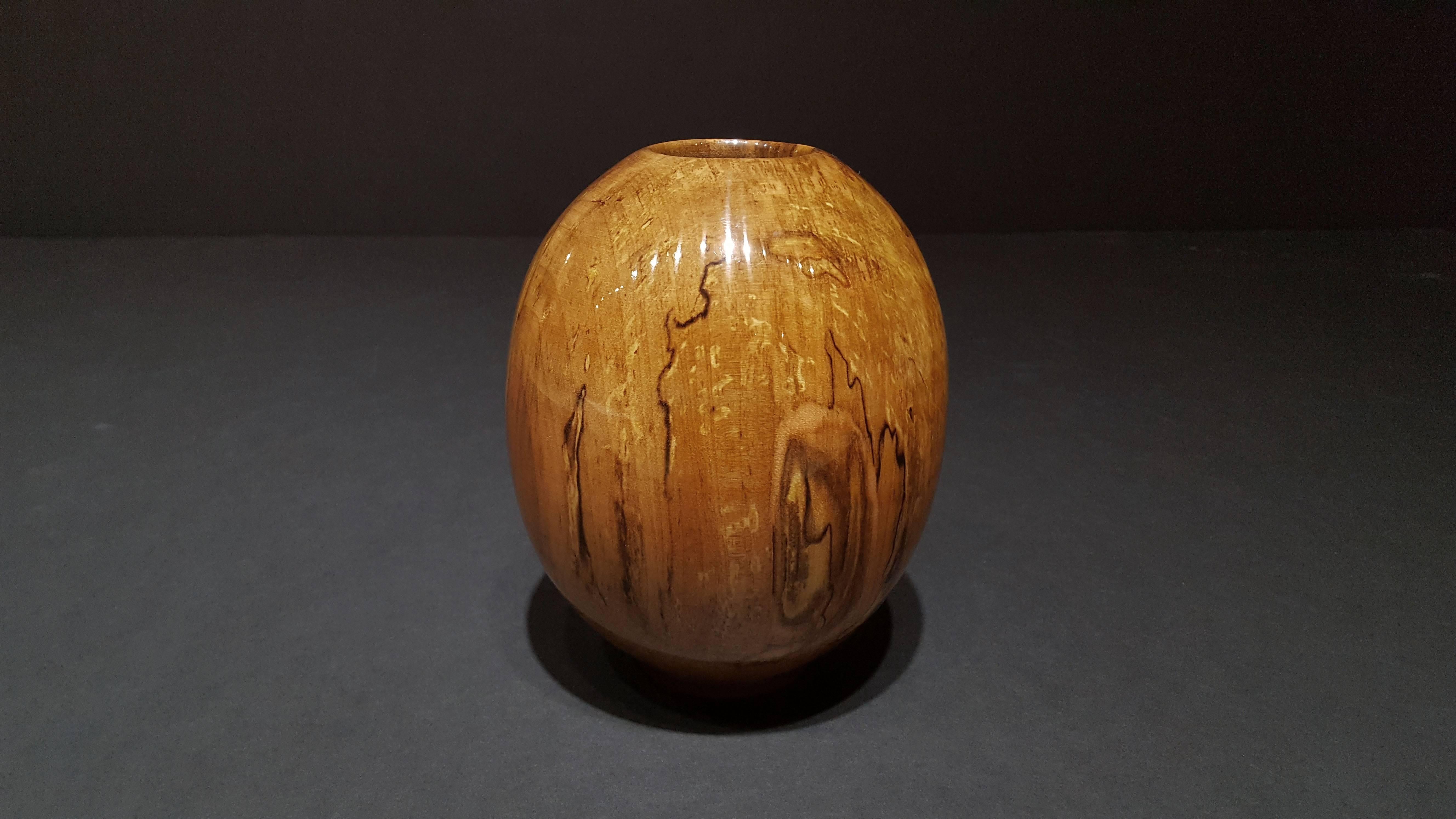 turned wood

Philip Moulthrop approaches his practice with the goal in mind to reveal the beauty and texture found in wood. He uses wood from trees native to his home in the southeastern United States. These are not exotic woods, however, they