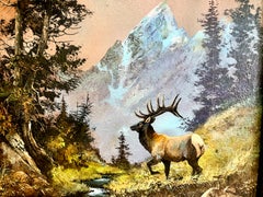 Paisaje del oeste de Estados Unidos con una montaña y un alce macho