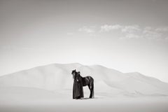 Two Cloaked Riders Crossing Vast Desert Sand Dunes