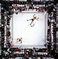 Retro Aerial view of Muhammad Ali victorious after round 3 knockout