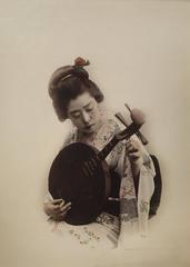 Antique Japanese Woman (with instrument)