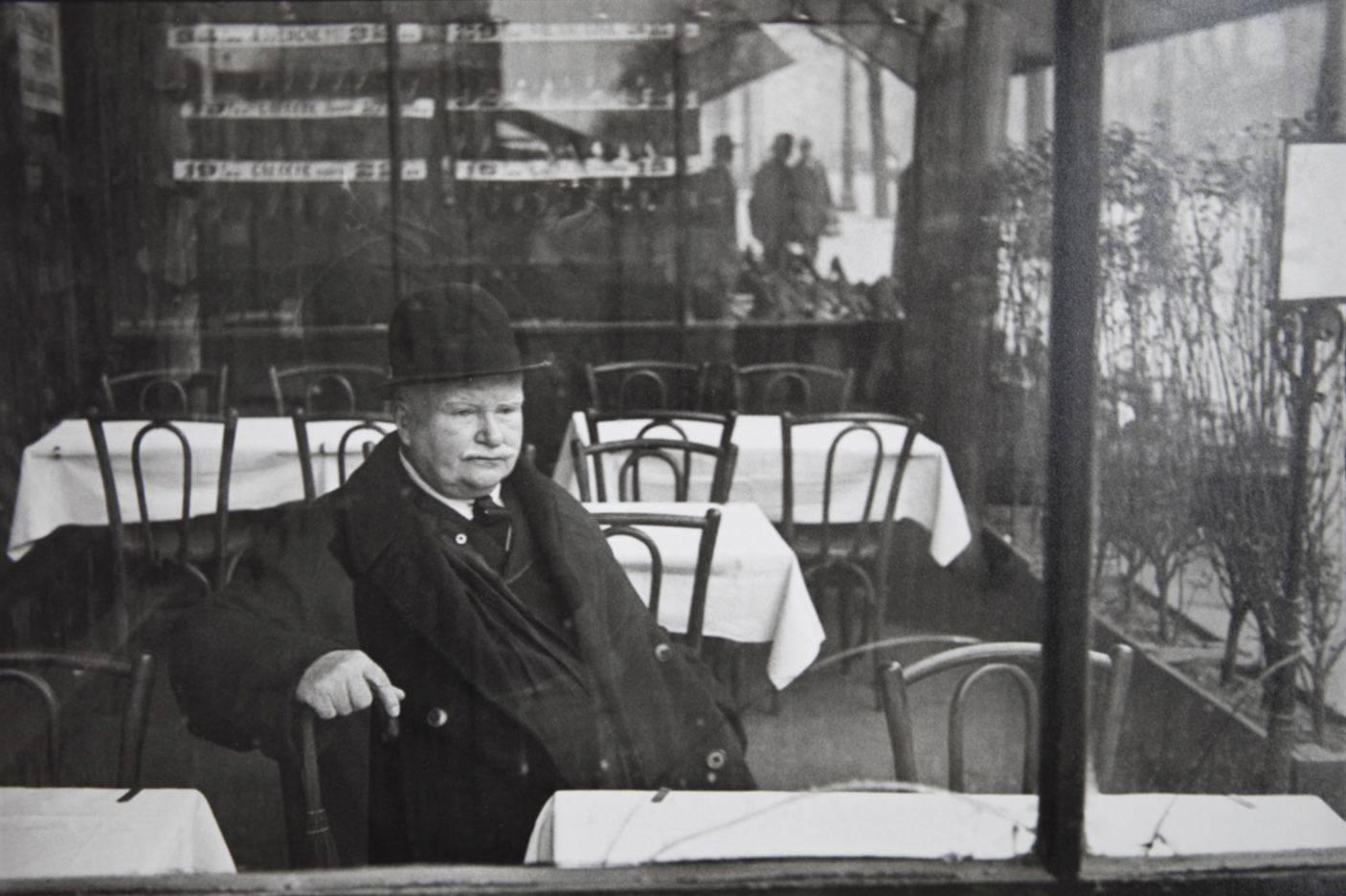 Henri Cartier-Bresson Black and White Photograph - Man at Cafe