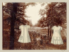Vintage Two Headless young figures in a wooded landscape with a clearing in the distance