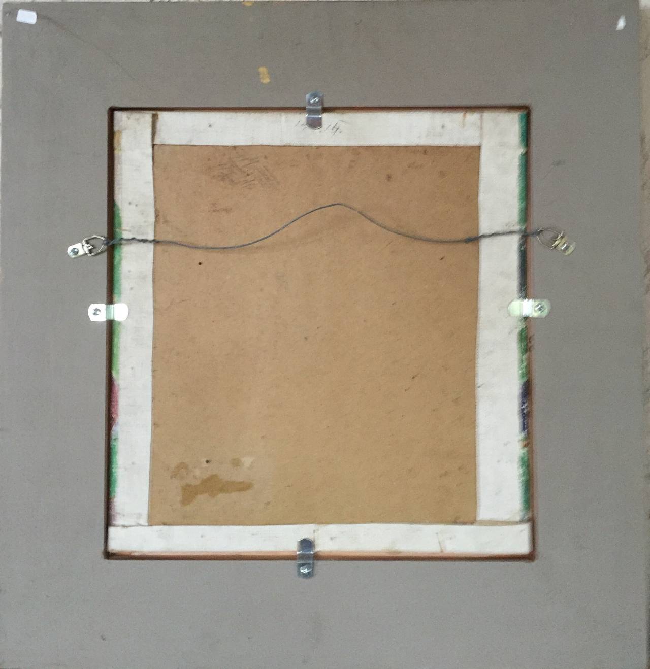 This work of a beautiful Balinese girl was most likely done in the late 1930's or early 1940's. Oil on canvas laid down on artist board. The frame is hand carved gold leaf custom made for this painting. Overall measurements are 21.5 x 20.5 inches.