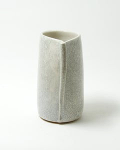 Piccolo vaso ovale in porcellana ceramica con effetto craquelé bianco e bordo frastagliato