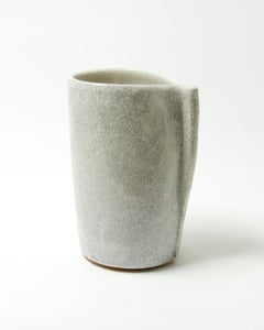 Piccolo vaso ovale in porcellana ceramica con effetto craquelé bianco e bordo frastagliato