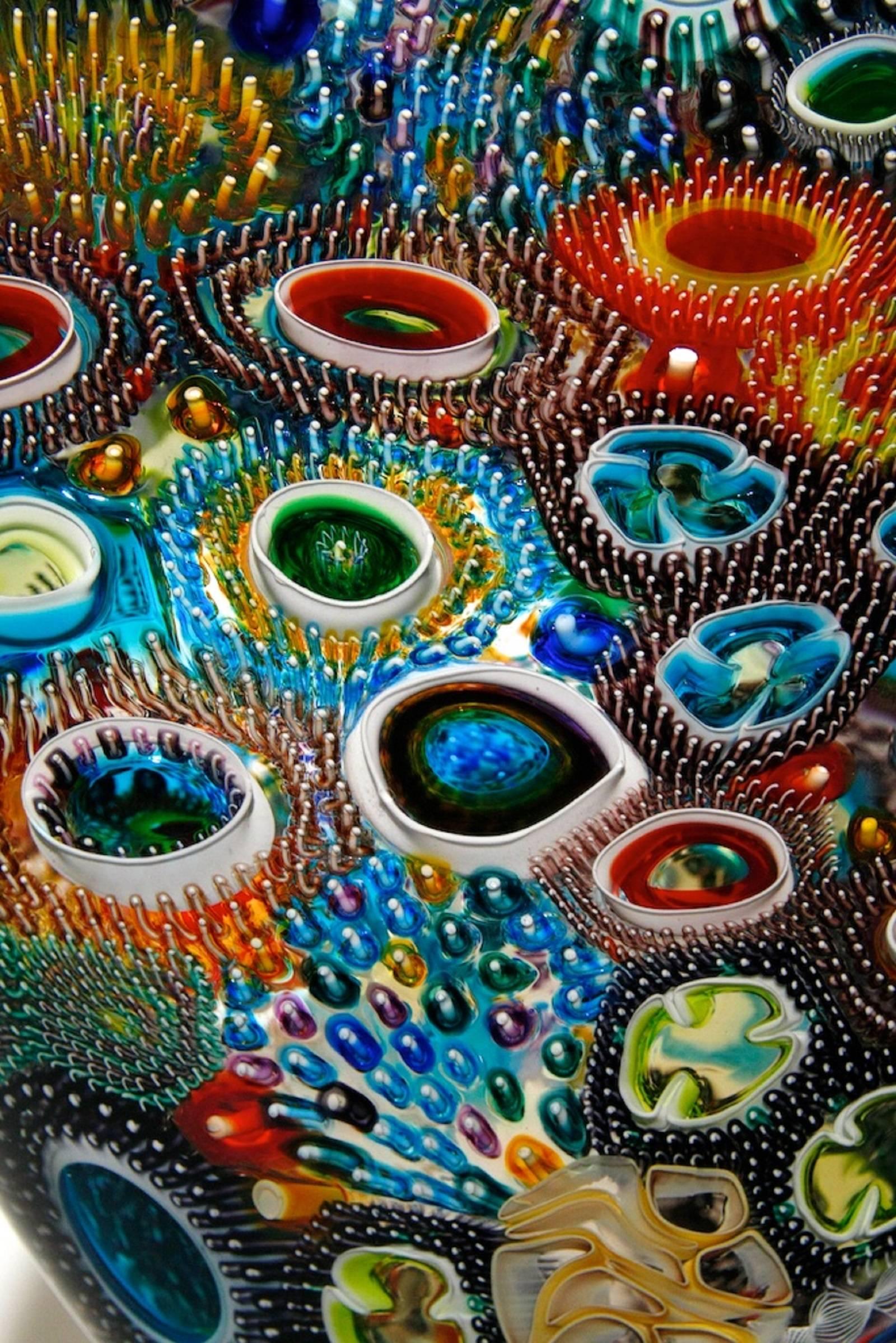 Artist David Patchen creates vivid and luminous sculptural glass works using the time-honored glass blowing techniques of cane and murrine.

From David's Artist Statement: 

I find glass as seductive as it is challenging. As a particularly