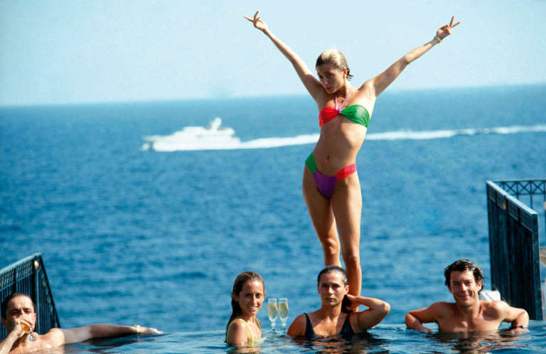 Slim Aarons Figurative Photograph - Warm Weather: Marie Chantal Strikes a Pose