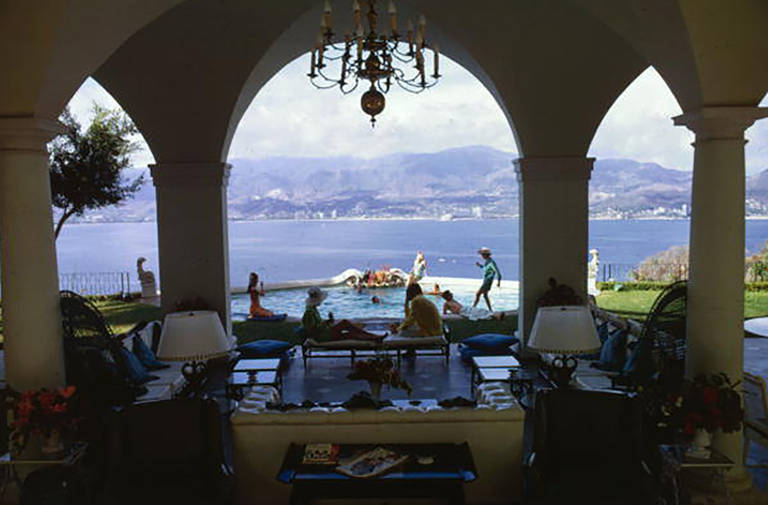 Description: Waterskiing from the Hotel Du Cap-Eden-Roc in Cap d'Antibes, France, 1969

Increasingly heralded for his influence, Slim Aarons (1916-2006) made a career out of photographing 