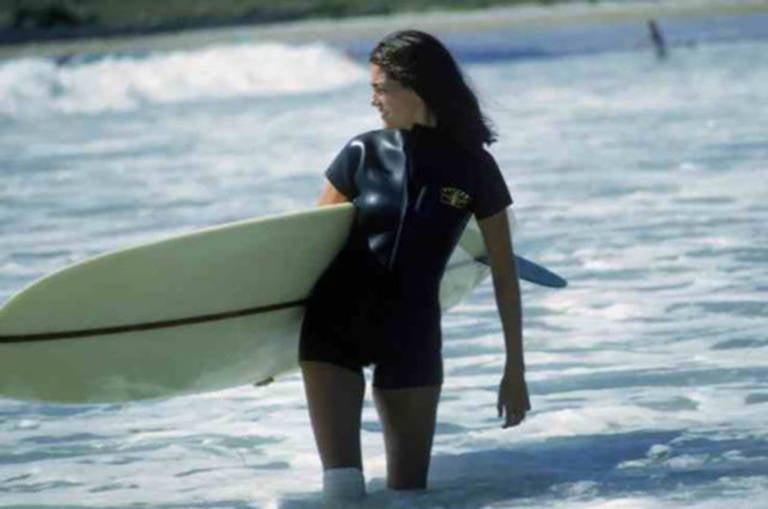 Slim Aarons Portrait Photograph - Minnie Cushing Surfing